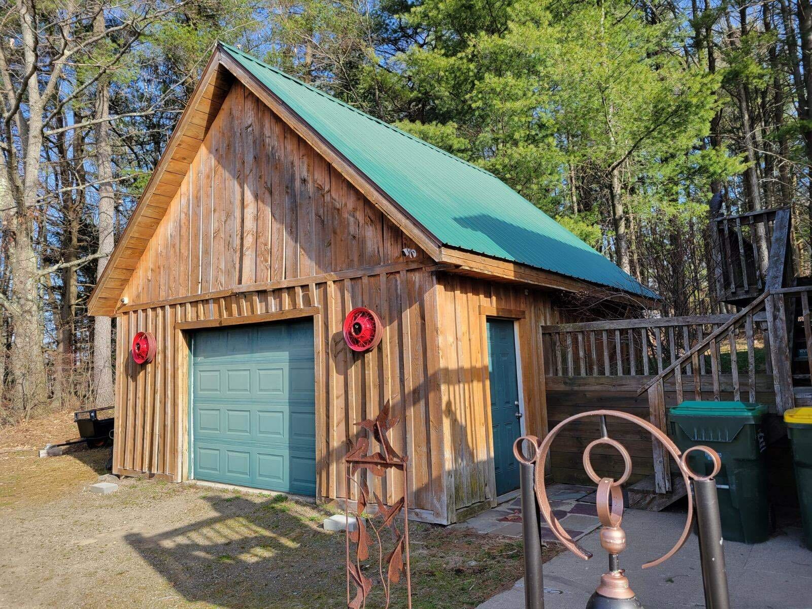 Custom cedar outbuilding garage green metal roof NY contractor