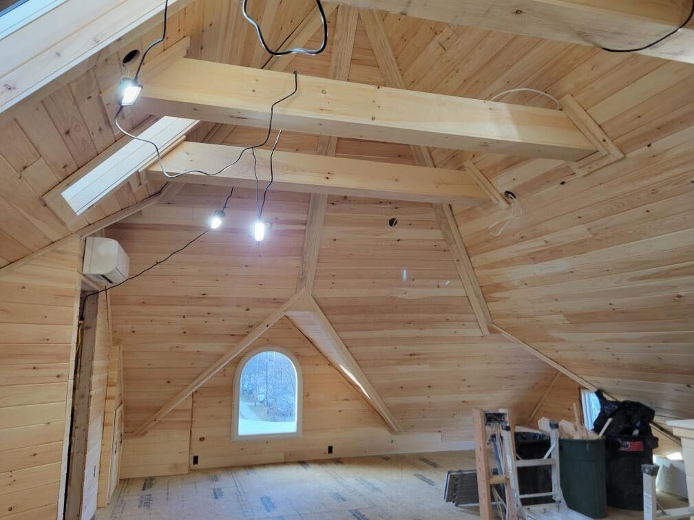 Custom arched window pine loft interior NY