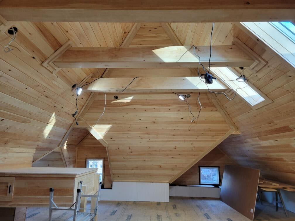 Cathedral ceiling pine loft with skylights NY
