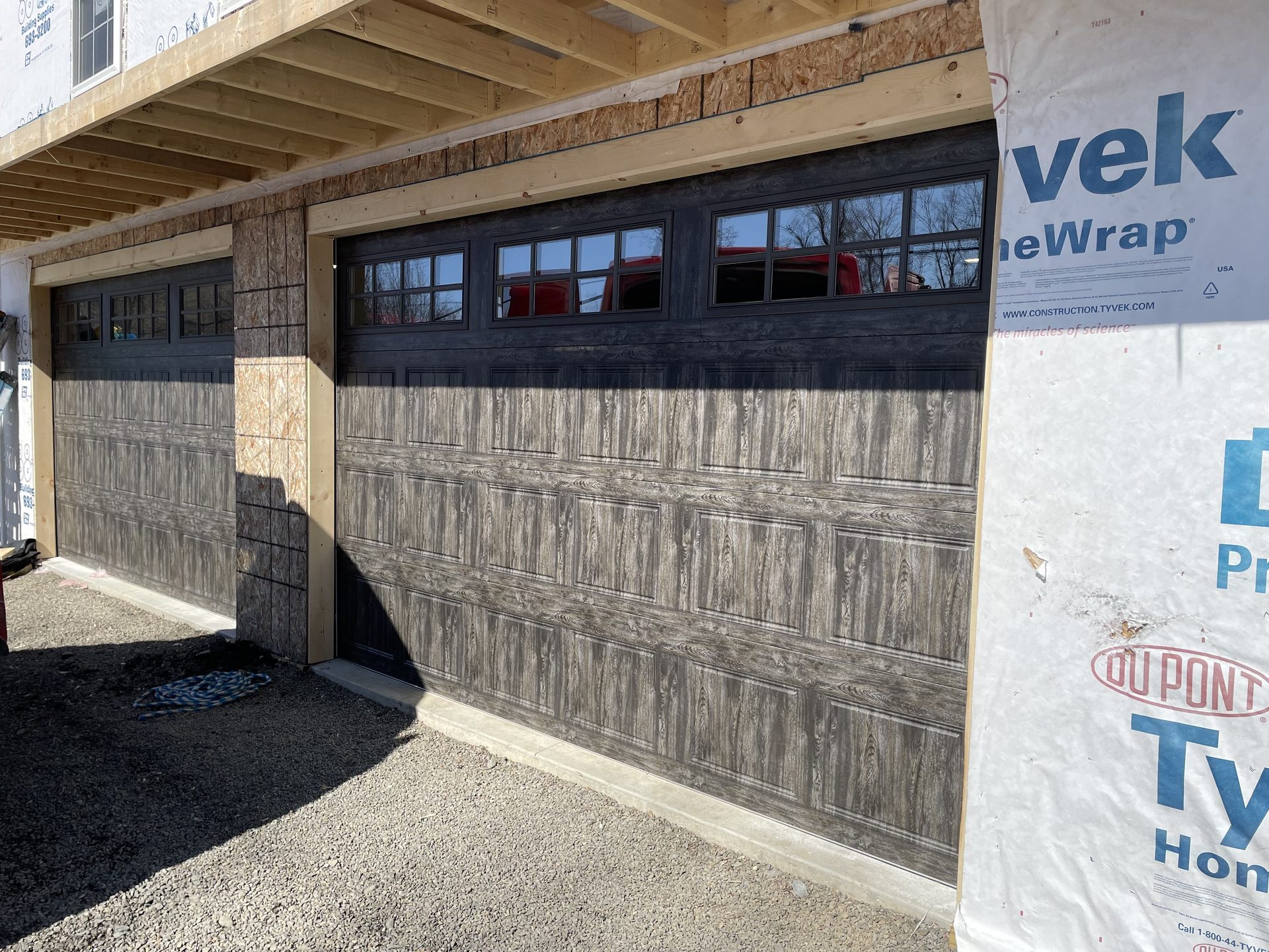 House wrap and siding installation in progress, Binghamton NY