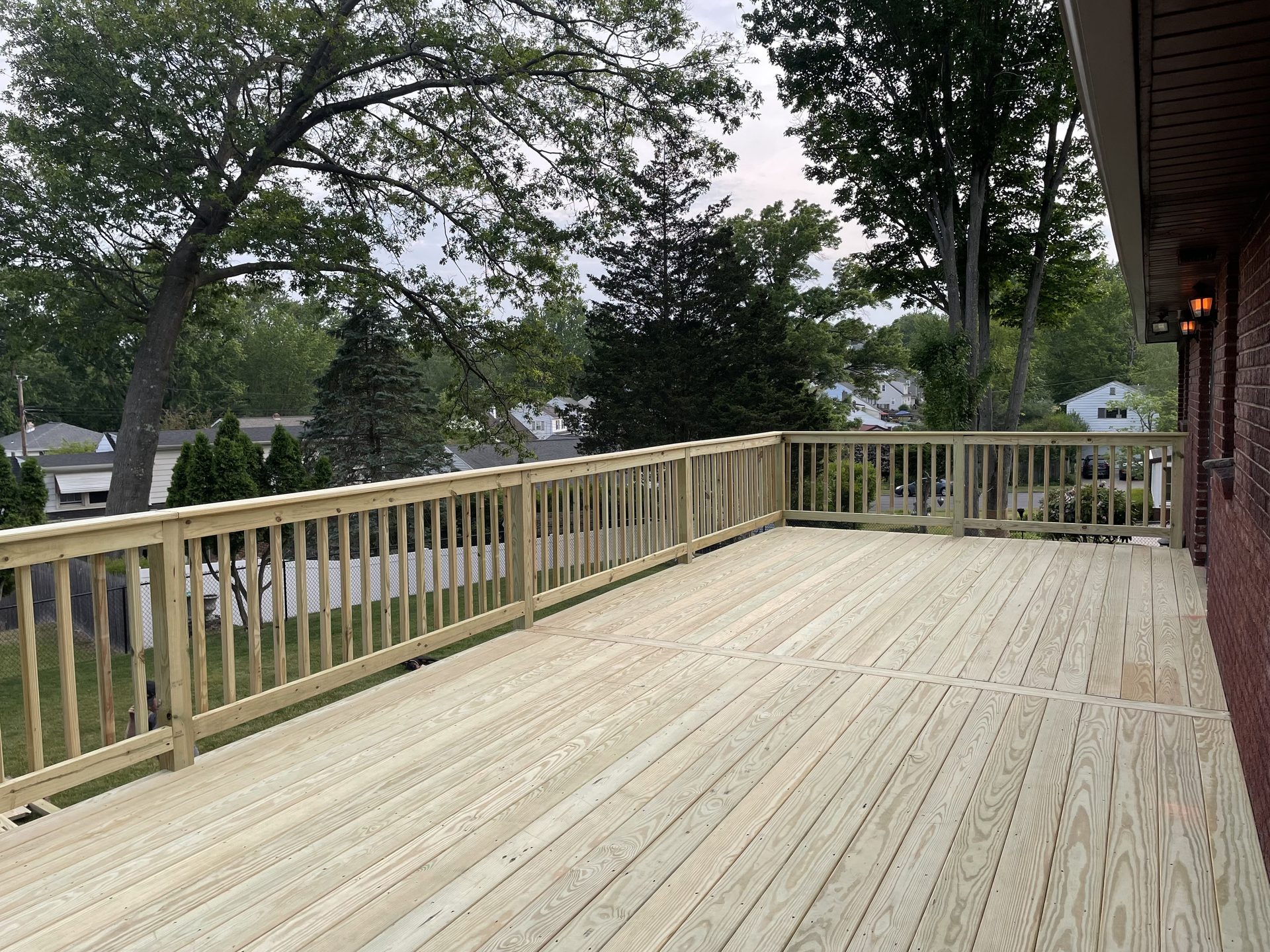 Finished composite deck — overhead view, SKJ Builders