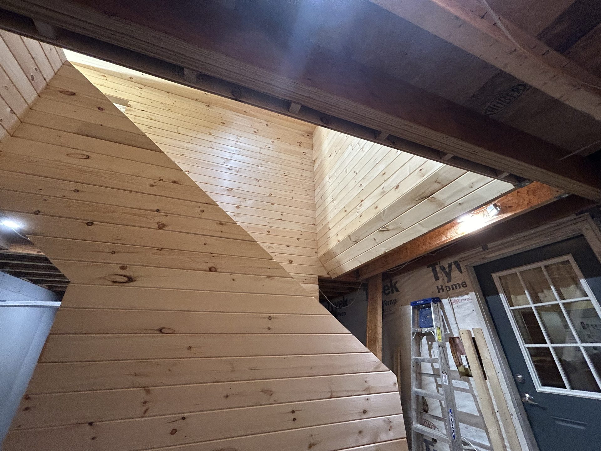 Pine wood loft ceiling detail, interior carpentry by SKJ Builders