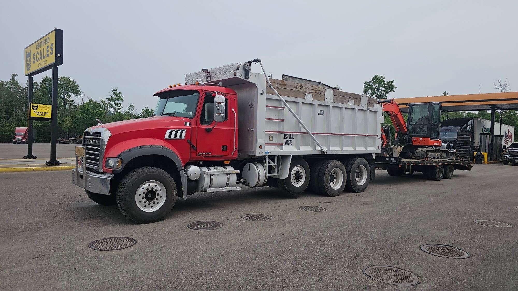 SKJ Builders excavation equipment on drainage job, Binghamton NY