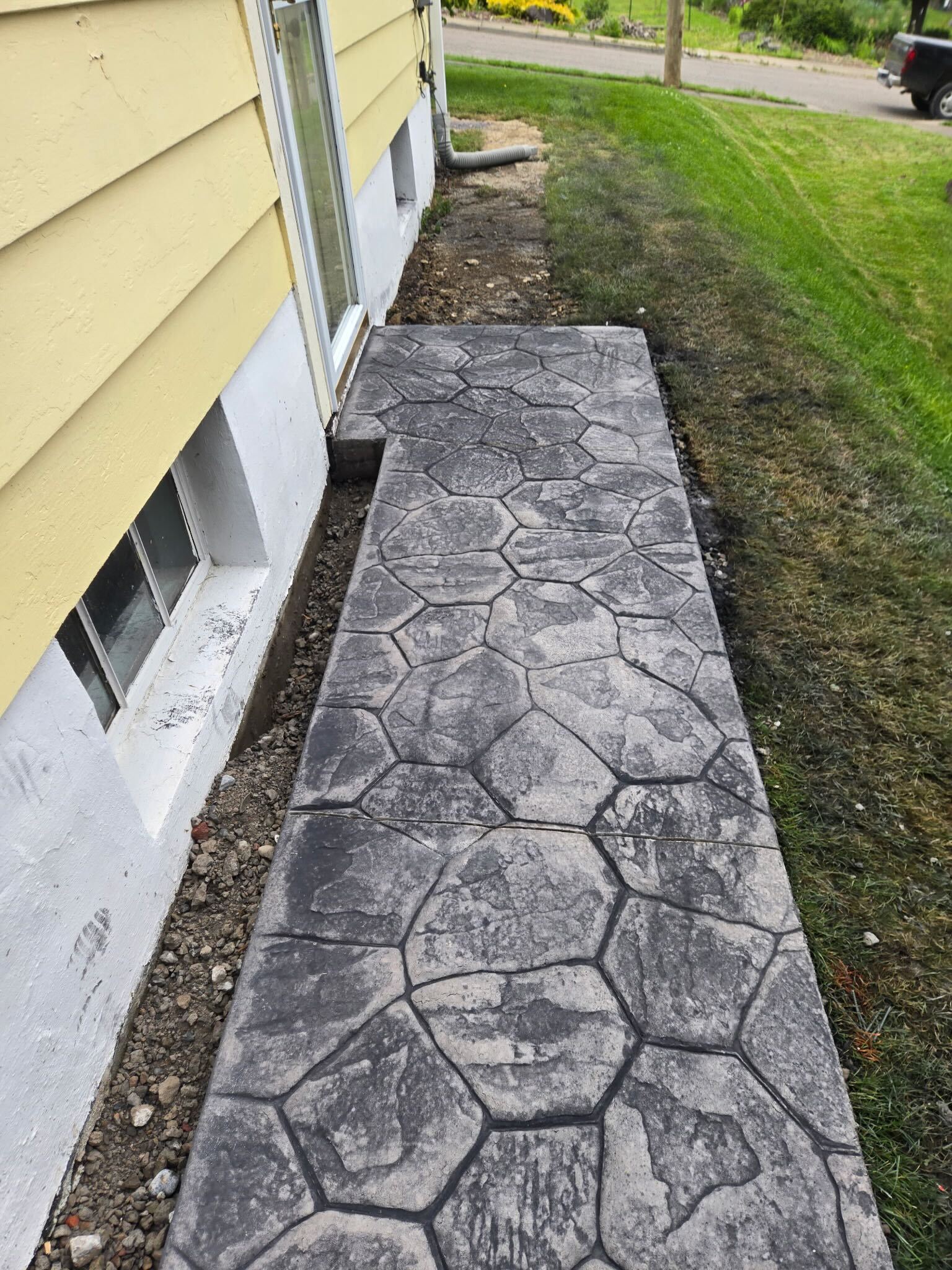 Stamped concrete boulder-pattern pathway — Binghamton NY